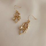 Joyce - Boucles Tombantes Fleur