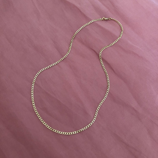 Plain chain gold necklace by Kurafuchi Jewelry.