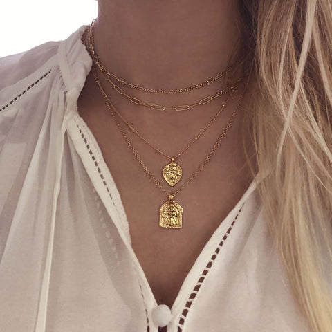 Dainty figaro chain necklace in gold, by Kurafuchi Jewelry.