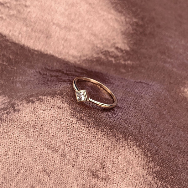 Beautiful gold crystal ring featuring a zircon crystal in a geometric shape. By Kurafuchi.