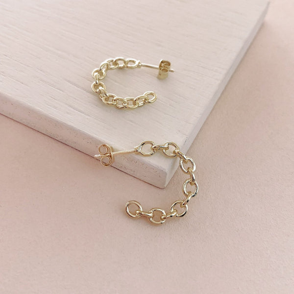 Gold open hoops made of a chain pattern. By Kurafuchi.